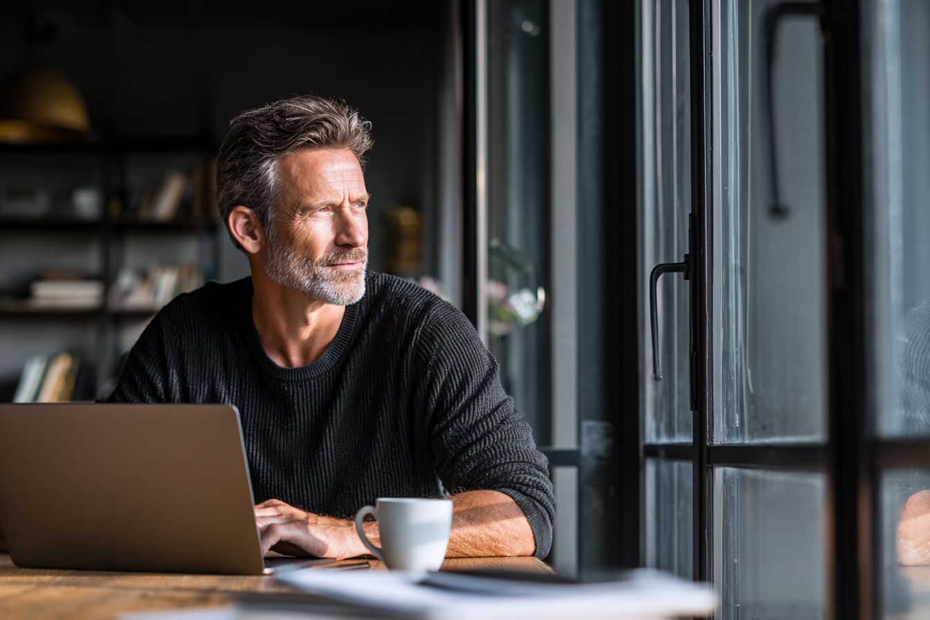 Confident man working with renewed energy and focus